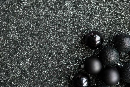 Festive christmas background with copy space on black backgroundの写真素材
