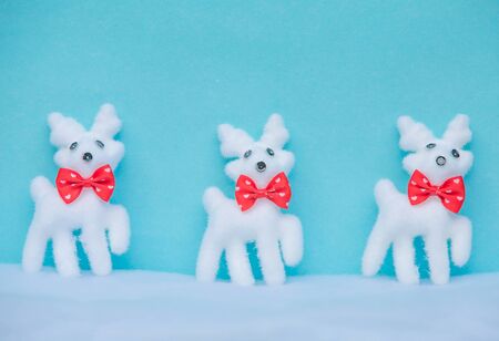 Blue Christmas or New Year background with reindeersの写真素材