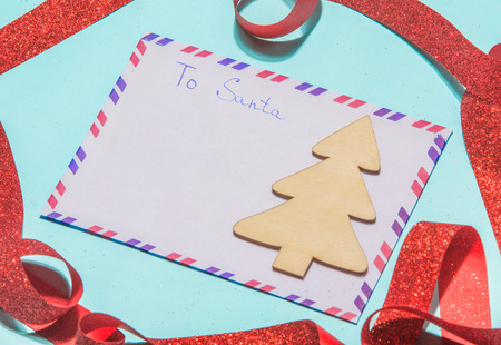 Envelope to Santa claus on a blue background. Lay flatの写真素材