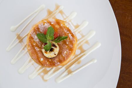 Pancake with banana and strawberry. Delicious dessertの写真素材