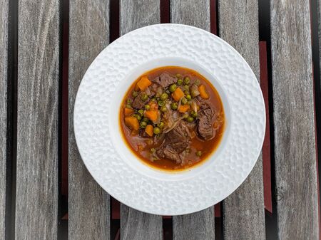 Ragout - beef meat roasted with carrots and veggiesの写真素材