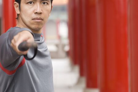 Chinese kungfu with attack pose.の写真素材