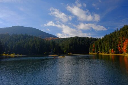 Synevyr mountain lake in Carpathian mountains, Ukraine, landscape day colorful shotの写真素材