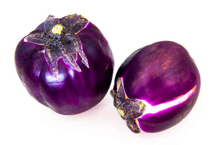 Round eggplants on white background の写真素材