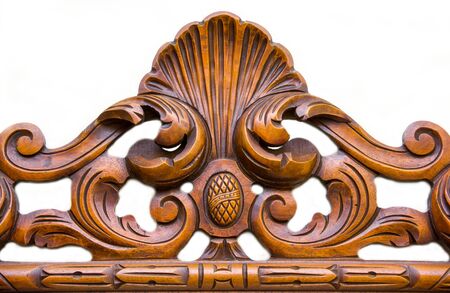Ornament carved in wood on white backgroundの写真素材