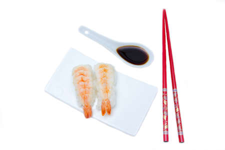 Nigiri with shrimp on a white background seen from aboveの写真素材
