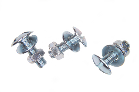 Metal nut and screw on a white background