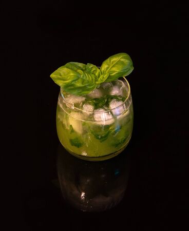 Cocktail, gin, basil, ice, lemon, saxony, Germany, mirroredの写真素材