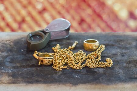ewelry gold and scope on the tie burnedの写真素材
