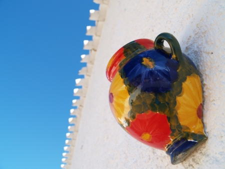 Coloured jug with blue skyの写真素材