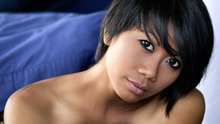 Charming woman Smile face close up and she sitingの写真素材