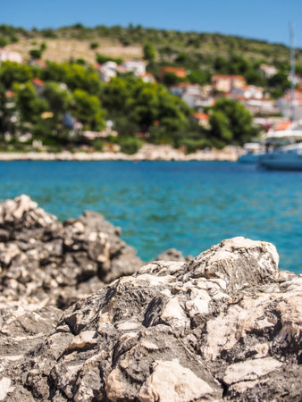 Croatia rocks on the seashore, sunny beachの写真素材
