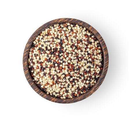 Pile of mixed raw quinoa, grain in wood bowl isolated on white background. top viewの写真素材