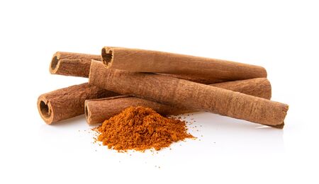 cinnamon sticks stacked isolated on white background