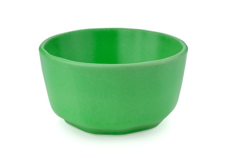 green ceramic bowl isolated on white backgroundの写真素材
