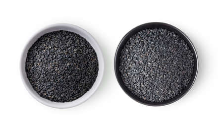 Sesame in a bowl isolated on white background. top viewの写真素材