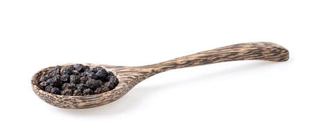 Peppercorn in wood spoon isolated on white backgroundの写真素材