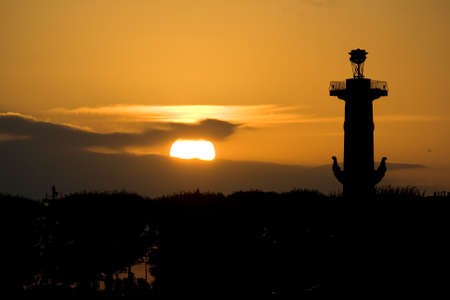 Rostral Column on background of sunset sky, Piterburgの写真素材
