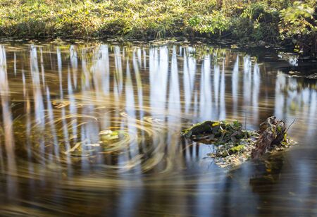 Autumn leaves dance on the river Pekhorka, Balashikha