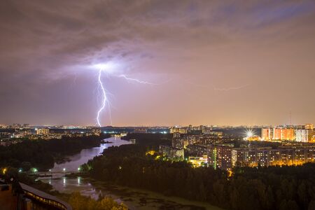 Night thunderstorm after a hot summer day on the river Pekhorka on Zarechnaya Street in Balashikha