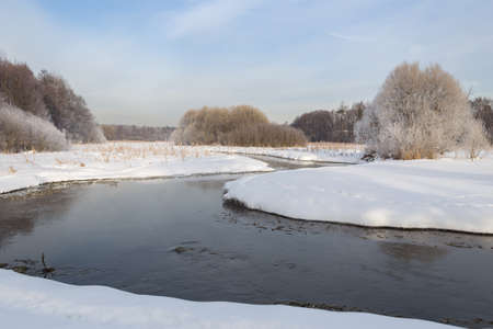 The winter landscape is a large frost on the Pekhorka river after a severe frost