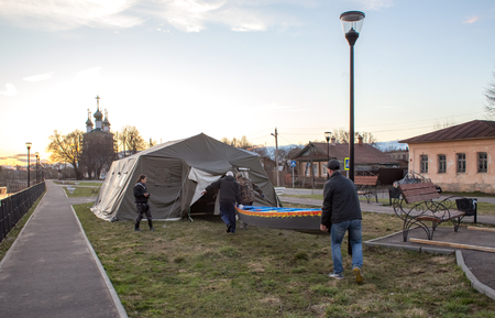 Kholuy, Ivanovo Region, Russia - April 27, 2018: Revival of the old tradition, the artistic painting of boats and their descent into the water during the spring flood of the Teza Riverのeditorial素材