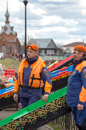 Kholuy, Ivanovo Region, Russia - April 27, 2018: Revival of the old tradition, the artistic painting of boats and their descent into the water during the spring flood of the Teza Riverのeditorial素材
