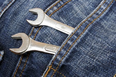Spanner's in pocket of work jeansの写真素材