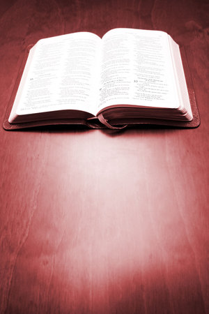 Bible on mahogany tableの写真素材