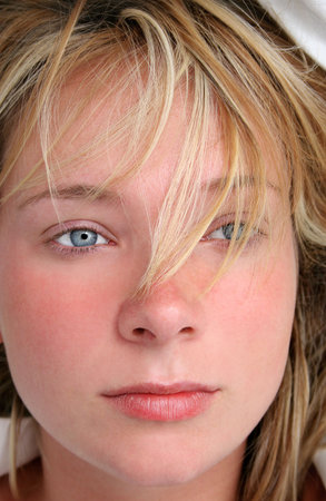 Blond woman with bed hairの写真素材