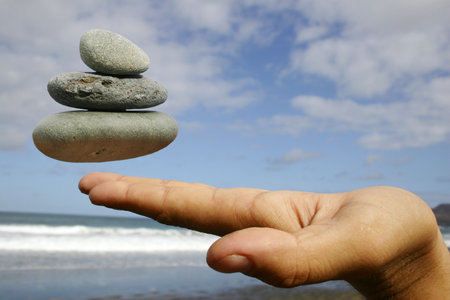 Pebble and Handの写真素材