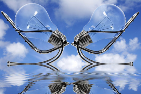 Two lightbulbs in chairs facing each other with blue sky background