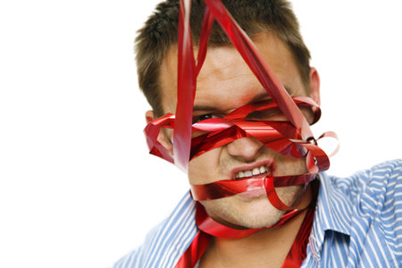 Man struggling against overpowering bureaucracy and red tapeの写真素材