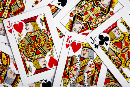 Playing card background with picture cards predominantのeditorial素材