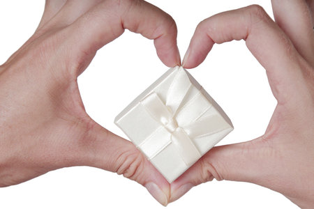 Heart Shaped DFingers and White Gift over whiteの写真素材