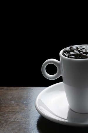 Coffee cup with coffee beansの写真素材