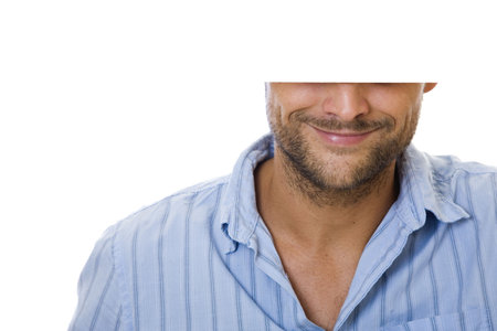 Man smiling and holding white sign with copyspaceの写真素材