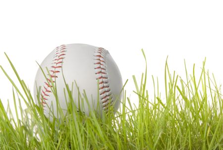 Baseball in grass with a white background