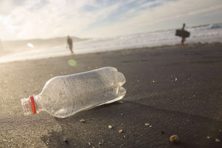 A plastic bottl washed up on the beachの写真素材