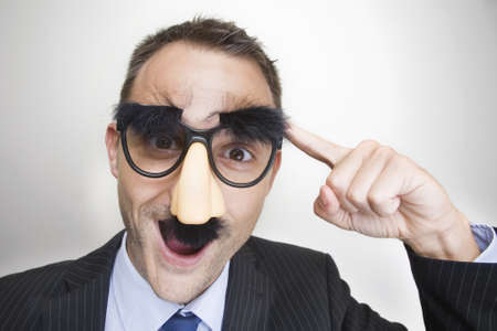 Businessman with an idea. Not sure how good it is though!の写真素材