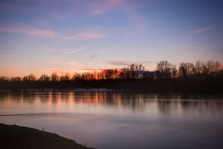 A wonderful sunset in a Northern Italy winterの写真素材