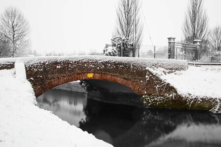 Bridge in the snow - Lombardy - Italyの写真素材
