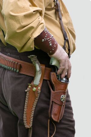 Close up of holster,pistol and knifeの写真素材