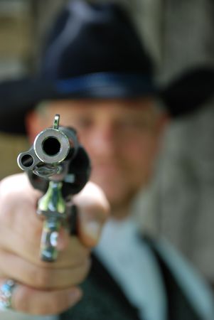 Man aiming pistolの写真素材