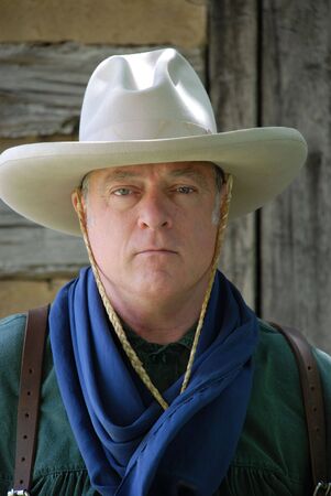 Tough looking cowboy in white hatの写真素材