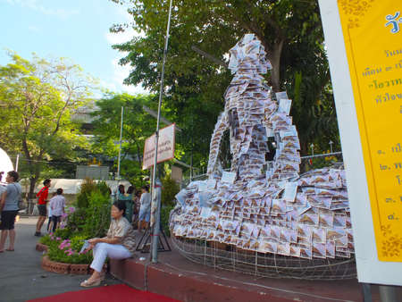 Wat Pathum Wanaram, Bangkok - March 7, 2012 - Makha Bucha Day, Buddha sculpture build from mass pictures.のeditorial素材