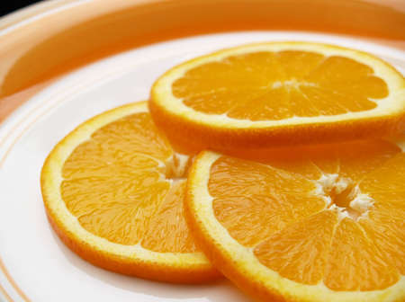 sliced oranges on a plateの写真素材