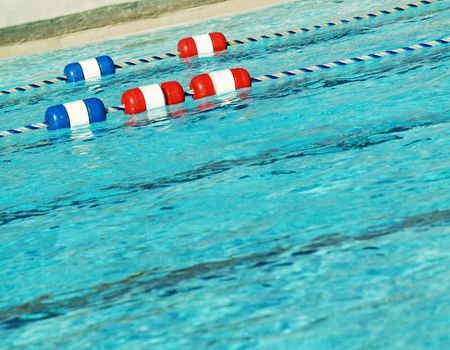 swimming pool with swim lanes roped off