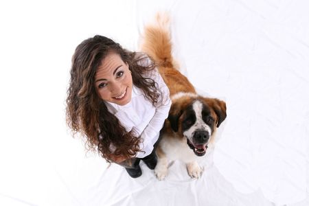 Looking down on a woman and her Saint Bernard.の写真素材