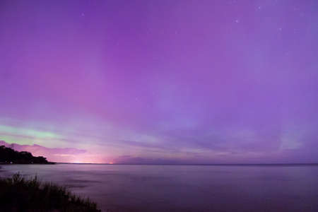 Northern Lights, Aurora Borealis displaying over Lake Michigan.の写真素材